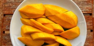 Freshly cut mangoes on a plate