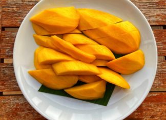Freshly cut mangoes on a plate
