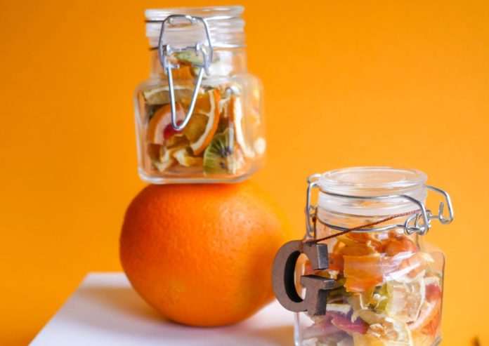 Assorted fruit inside a jar