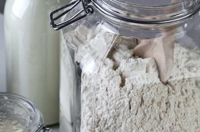 Mason jar filled with spelt flour
