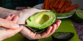 Cutting into an avocado