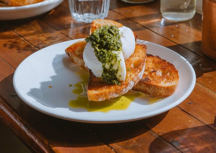 Poached egg with pesto on top