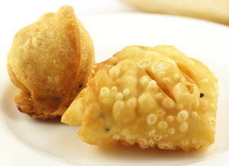 South Asian Sihngara or Samosa and Nimki on plate
