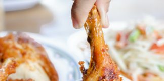 Chicken dipping in sauce