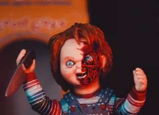 Chucky puppet holding knife