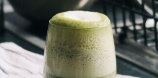 Cup of green beverage