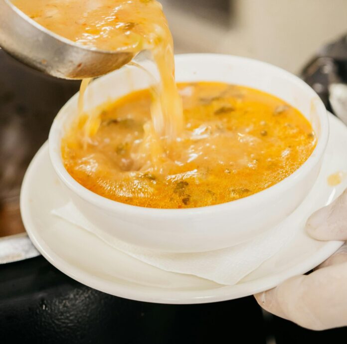 Pouring Delicious Soup